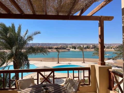 Sabina 1br apartment Lagoon view with shared pool By BFG Beit Fel Gouna — balance & terrace