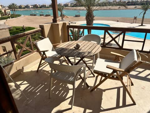 Sabina 1br apartment Lagoon view with shared pool By BFG Beit Fel Gouna — balance & terrace