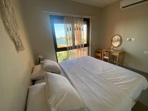 Boho Chic - Scenic Lagoon View at Tawila Gouna — hotel room