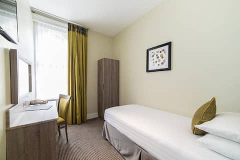 Phoenix Hotel — hotel room