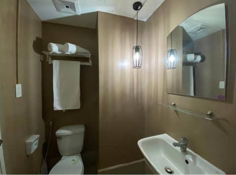 Twin Bed Unit- MIGAs Haven at Sunvida Tower — bathroom
