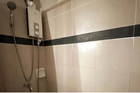 Twin Bed Unit- MIGAs Haven at Sunvida Tower — bathroom