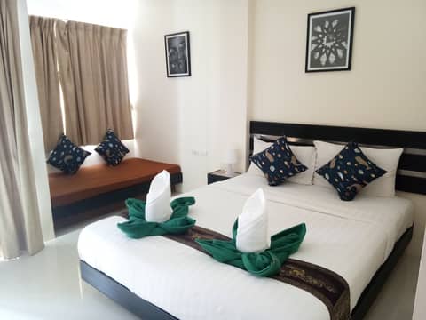 Island Patong Beachfront Apartments — bedroom