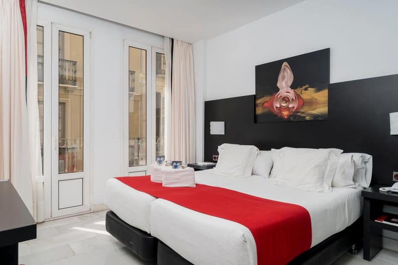 Hotel del Pintor by Hoteles con Cultura — bedroom