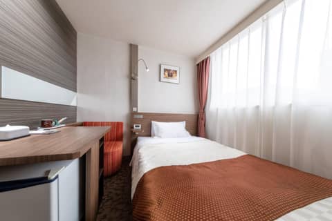 Hiroshima Intelligent Hotel Stadium Mae — hotel room