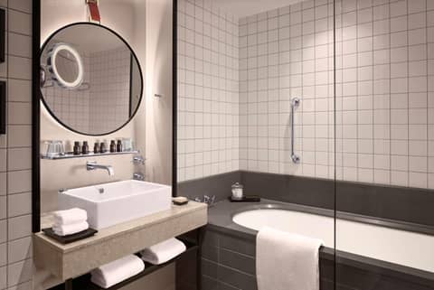 The Trafalgar St James London Curio Collection by Hilton — bathroom