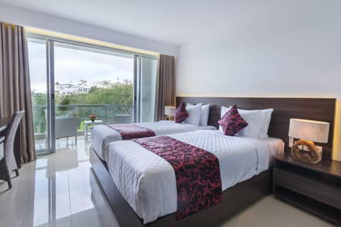 Adhiloka — hotel room