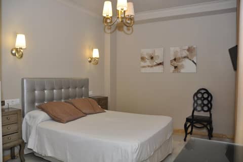Hotel Sercotel Doña Carmela — bedroom