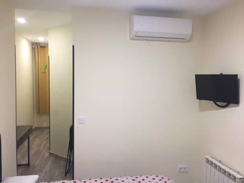 JQC Rooms — hotel room