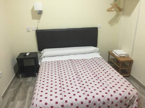 JQC Rooms — hotel room