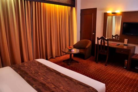 Kartika Chandra — hotel room