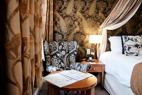 The Mad Hatter Hotel — hotel room