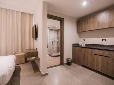 TK Suites — hotel room