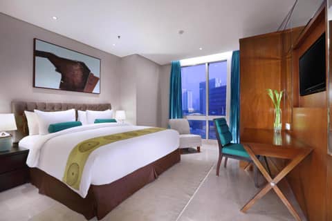 The Grove Suites by Grand Aston — hotel room