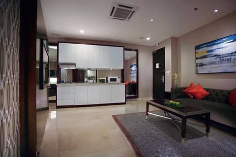 The Grove Suites by Grand Aston — hotel room