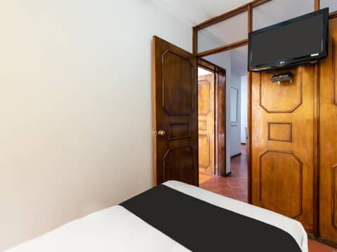 Suites Internacional — hotel room