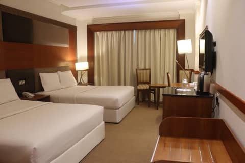 Delmon Hotel — hotel room