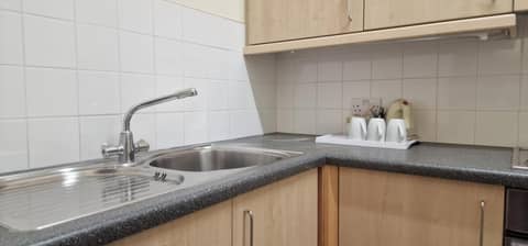 Mermaid Suite Hotel — kitchen