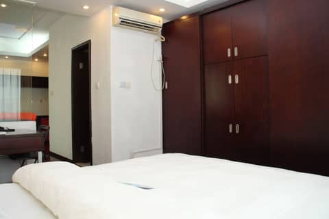 World Union Service Apartment Cosmo — hotel room