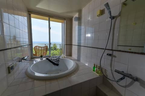 Odysis Onna Resort Hotel — bathroom