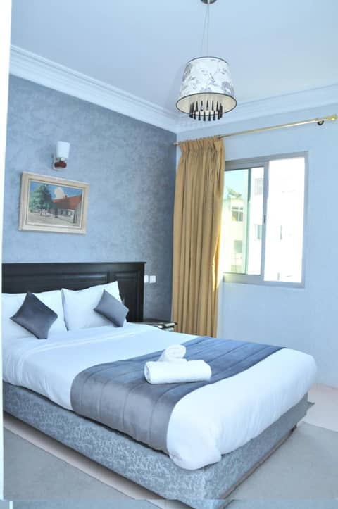 EAST WEST HOTEL — hotel room