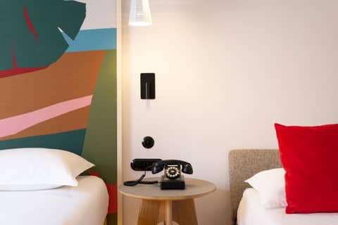 Hôtel De La Paix — hotel room