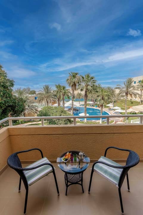 Metropolitan Al Mafraq Hotel — balance & terrace