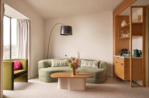 The BoTree London, Curio Collection by Hilton — living room