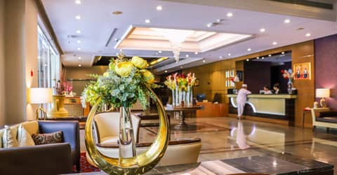 Ramee Guestline Hotel — recepcion & lobby
