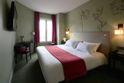 Hôtel Orchidée — hotel room