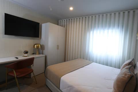 Hotel America — hotel room